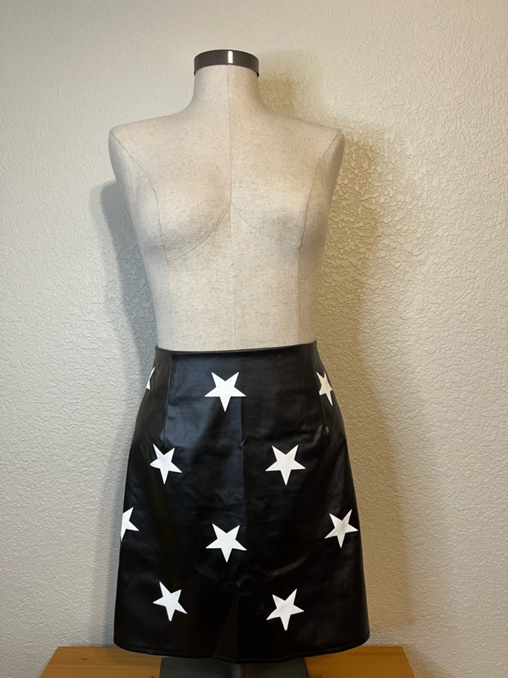 Black Star-Print Faux Leather Mini Skirt